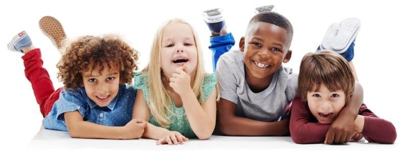 Four children, smiling and hanging out